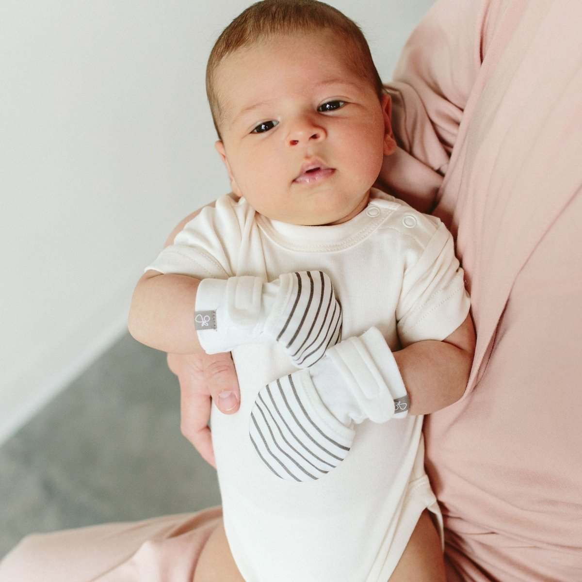 2-PACK MITTS baby hand mitts in white with gray striped cuffs, soft fabric and adjustable closures