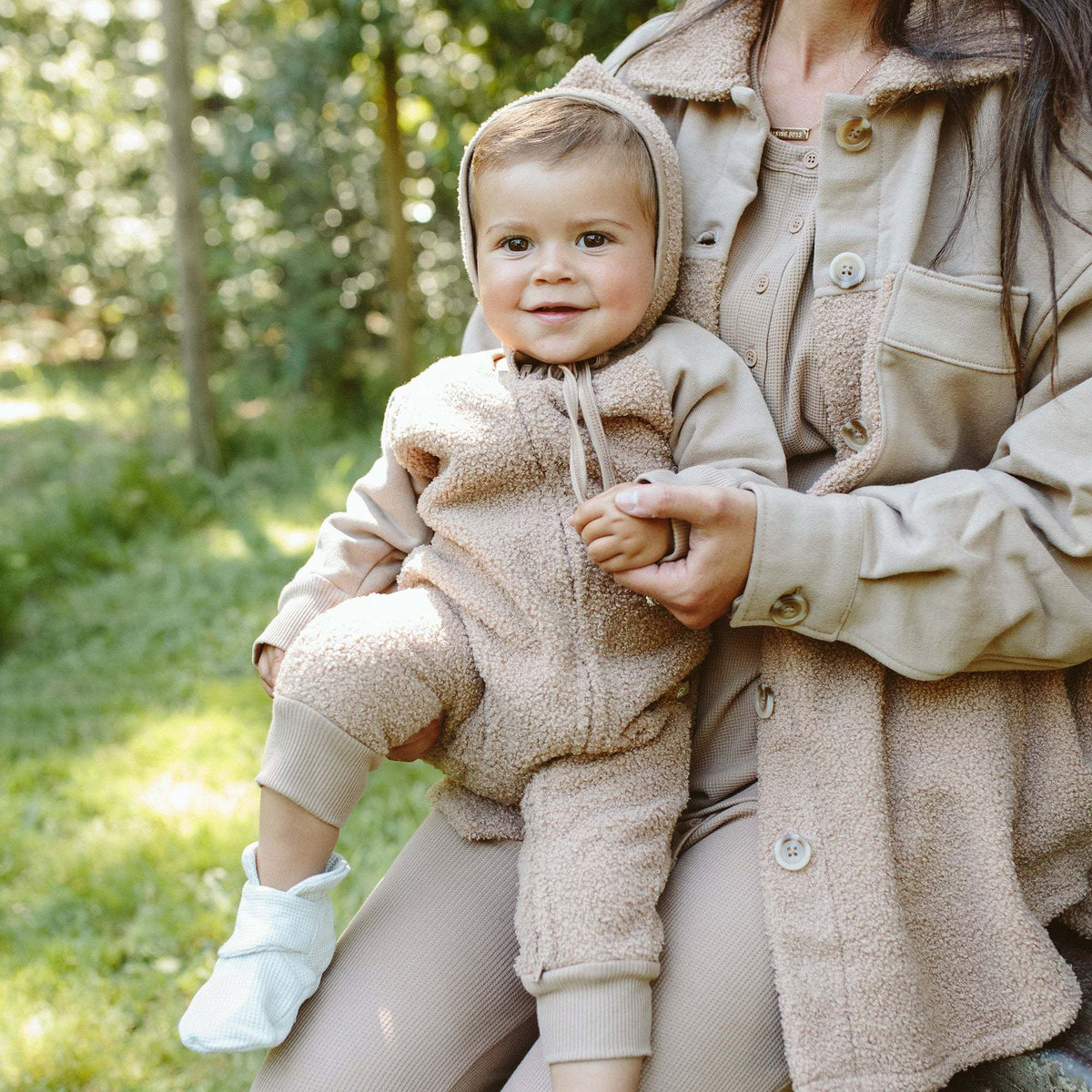Baby SHERPA BONNET | ALABASTER in soft cream sherpa, with a rounded crown and ties under the chin.