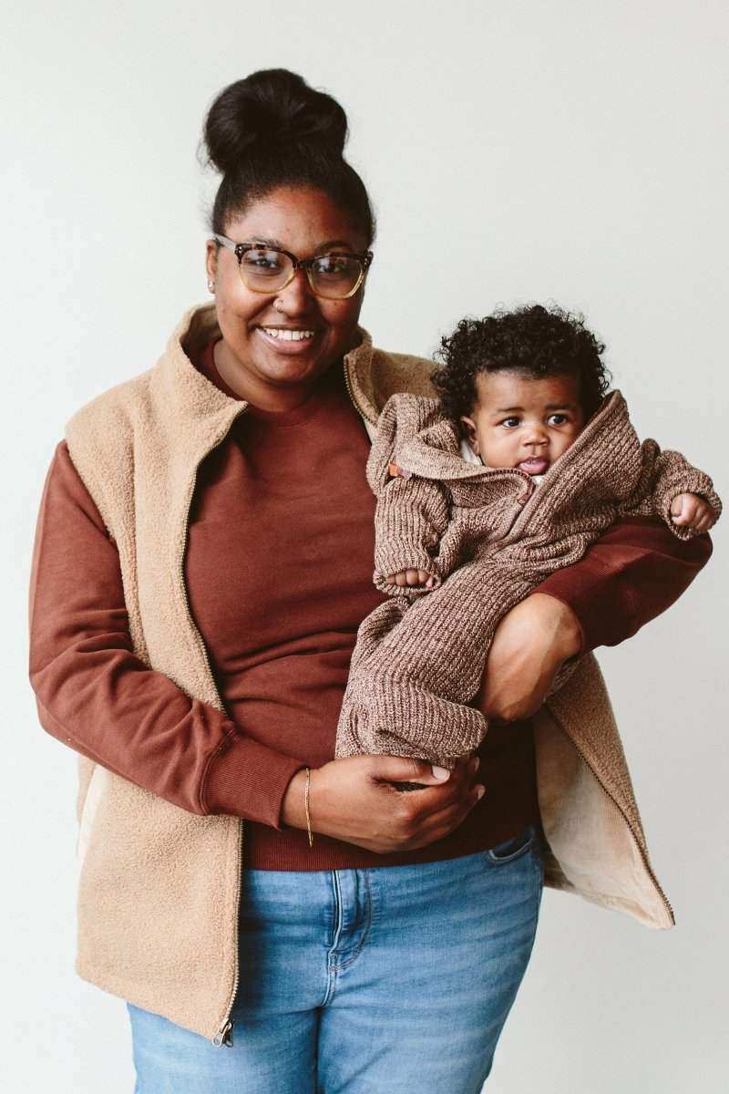ADULT SHERPA/CORDUROY REVERSIBLE VEST in beige sherpa with a soft, textured finish and open front