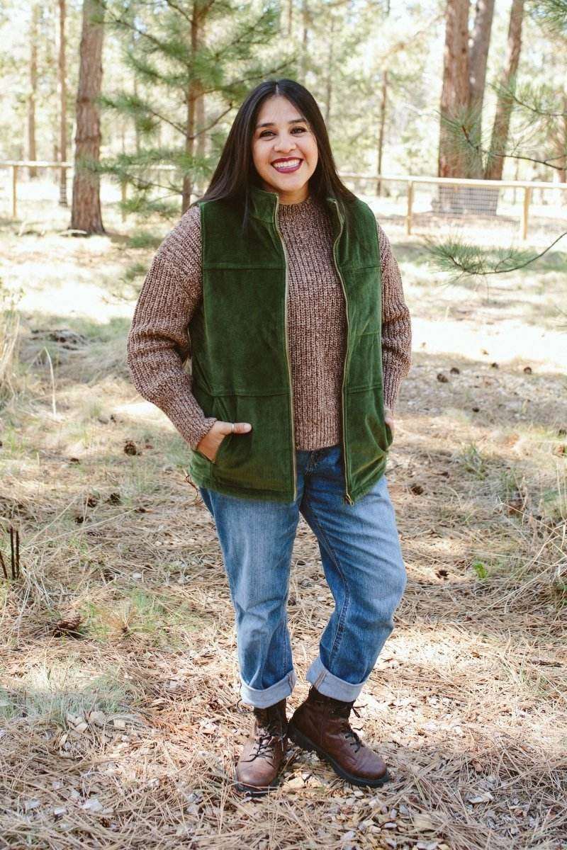 ADULT SHERPA/CORDUROY REVERSIBLE VEST in deep green corduroy with a plush sherpa lining, worn open