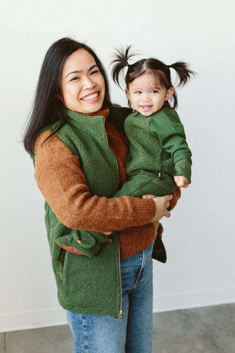 ADULT SHERPA/CORDUROY REVERSIBLE VEST in spruce green sherpa, with a plush texture and zip-front design