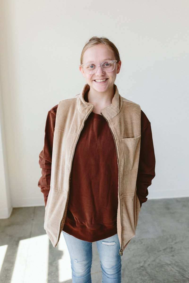 ADULT SHERPA/CORDUROY REVERSIBLE VEST in tan corduroy with a soft sherpa lining and zip-front pockets