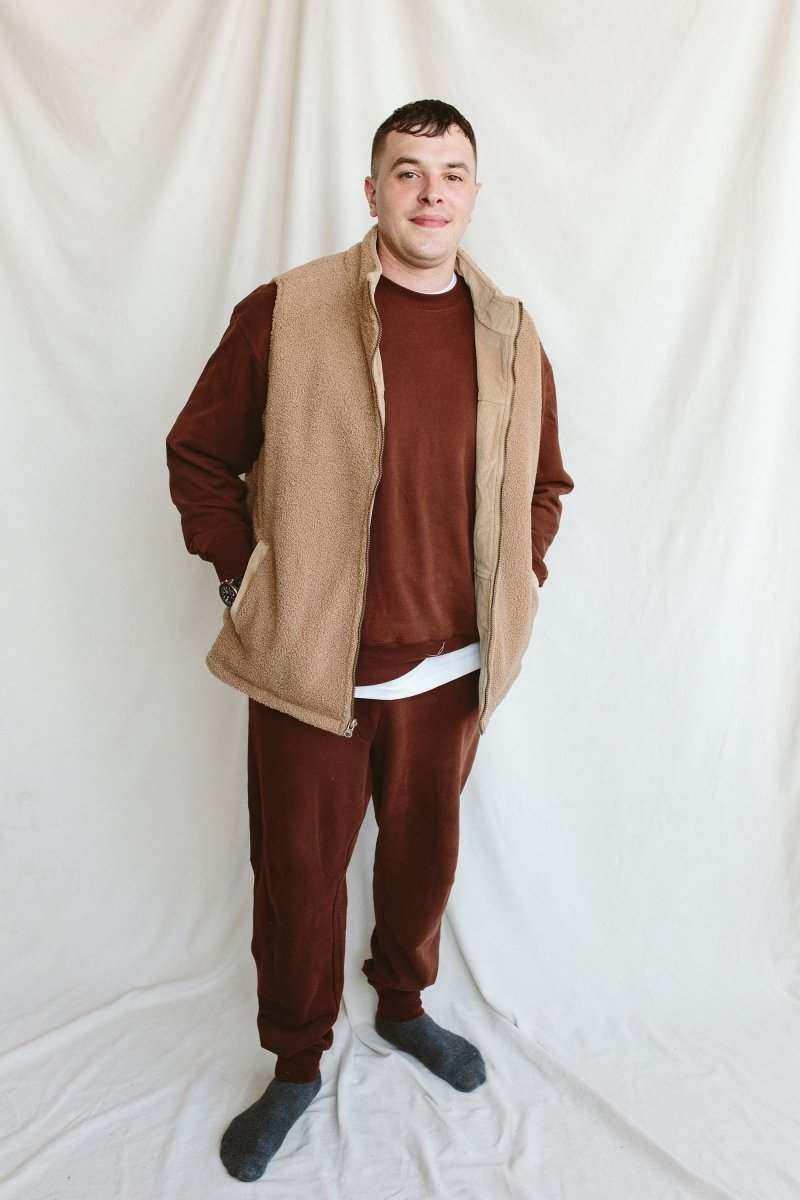 ADULT SHERPA/CORDUROY REVERSIBLE VEST in tan sherpa fleece, sleeveless with a zip front and stand collar