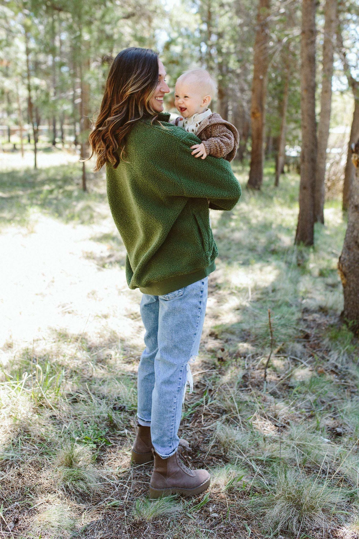 Adult Sherpa Zip Pullover in spruce green, with a plush fleece texture, half-zip neckline, and front pocket