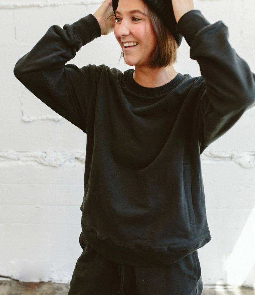 ADULT SWEATSUIT PANT in asphalt black, with a soft solid finish and relaxed fit, paired with a matching crewneck sweatshirt