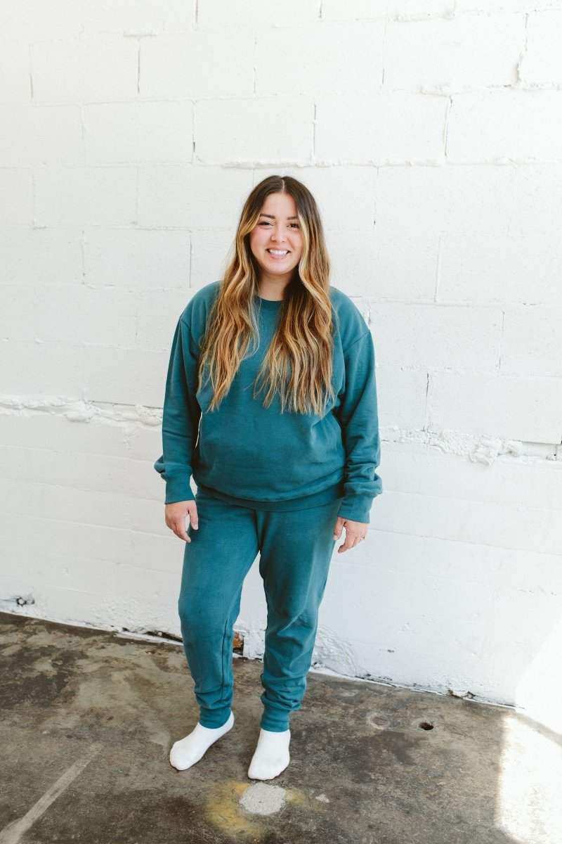 ADULT SWEATSUIT PANT in teal cotton terry with a solid pattern, elastic waist and tapered cuffs, shown with matching sweatshirt