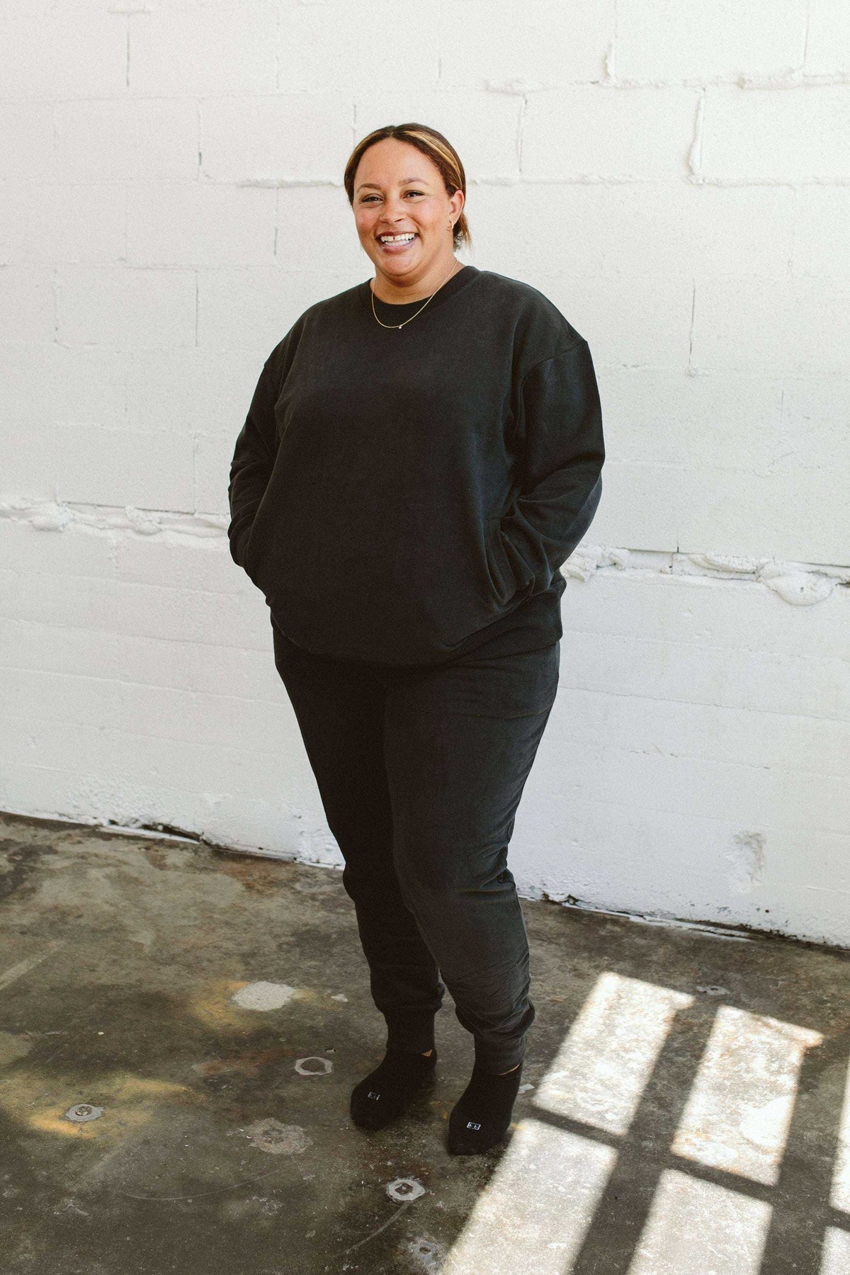 ADULT SWEATSUIT TOP in charcoal black French terry, with a relaxed fit, crew neckline and ribbed cuffs
