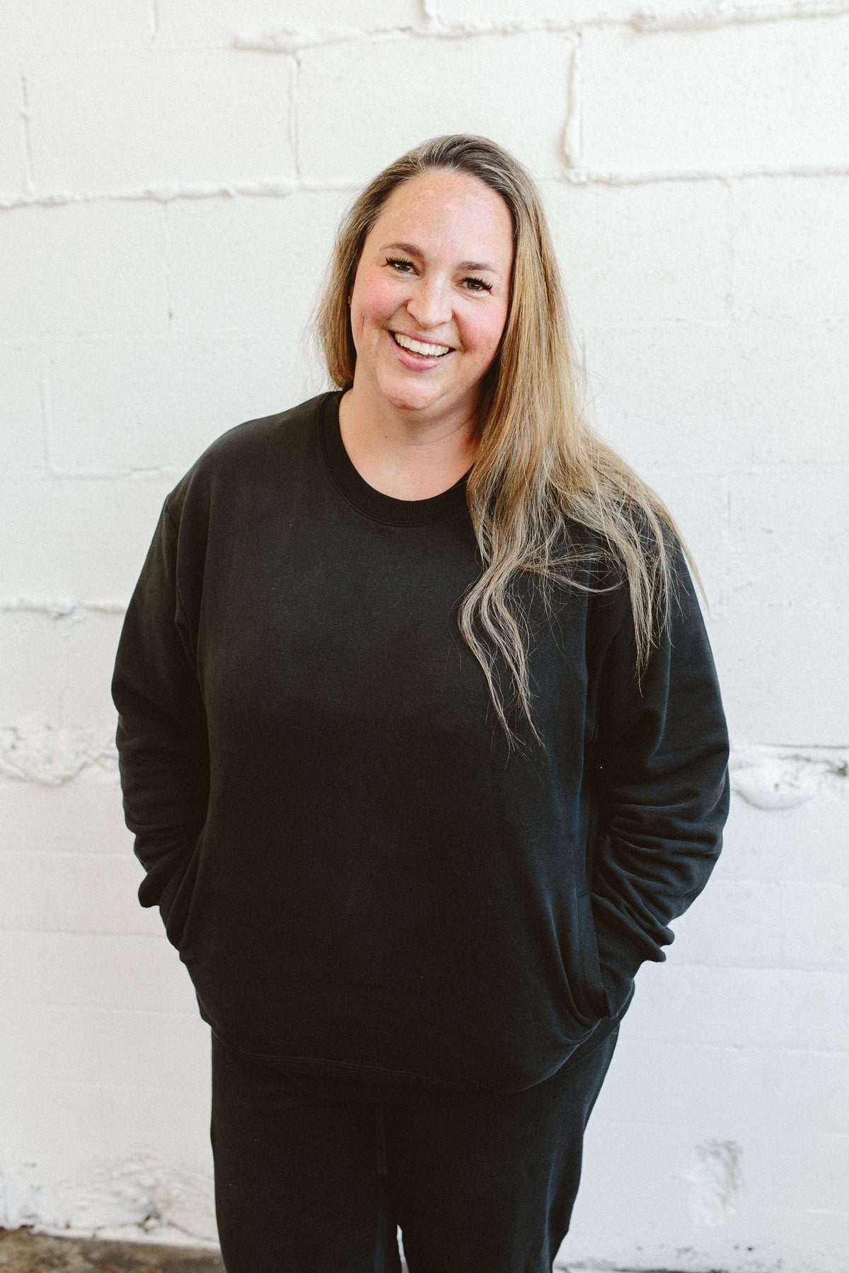 ADULT SWEATSUIT TOP in solid charcoal with a soft terry appearance, relaxed fit, crew neckline and ribbed cuffs