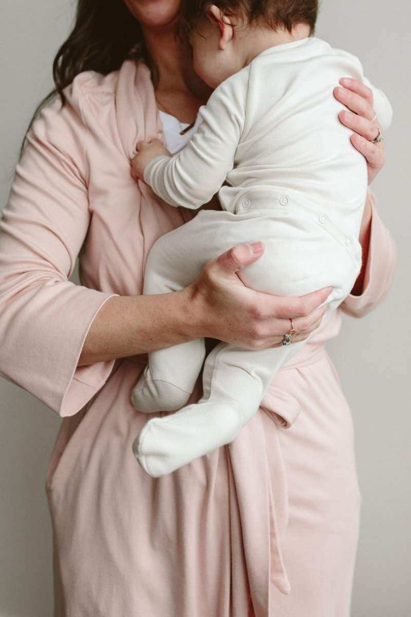 GROW WITH YOU FOOTIE baby footie in solid cloud white, with long sleeves, covered feet and a two-way zip