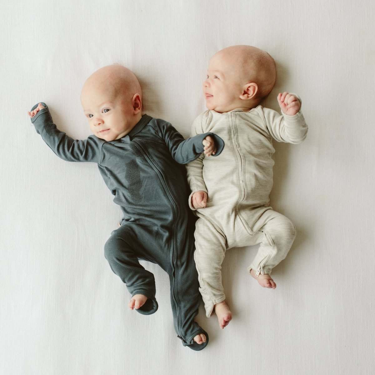 GROW WITH YOU FOOTIE baby convertible jumpsuit in midnight and beige, soft solid fabric with zip fronts