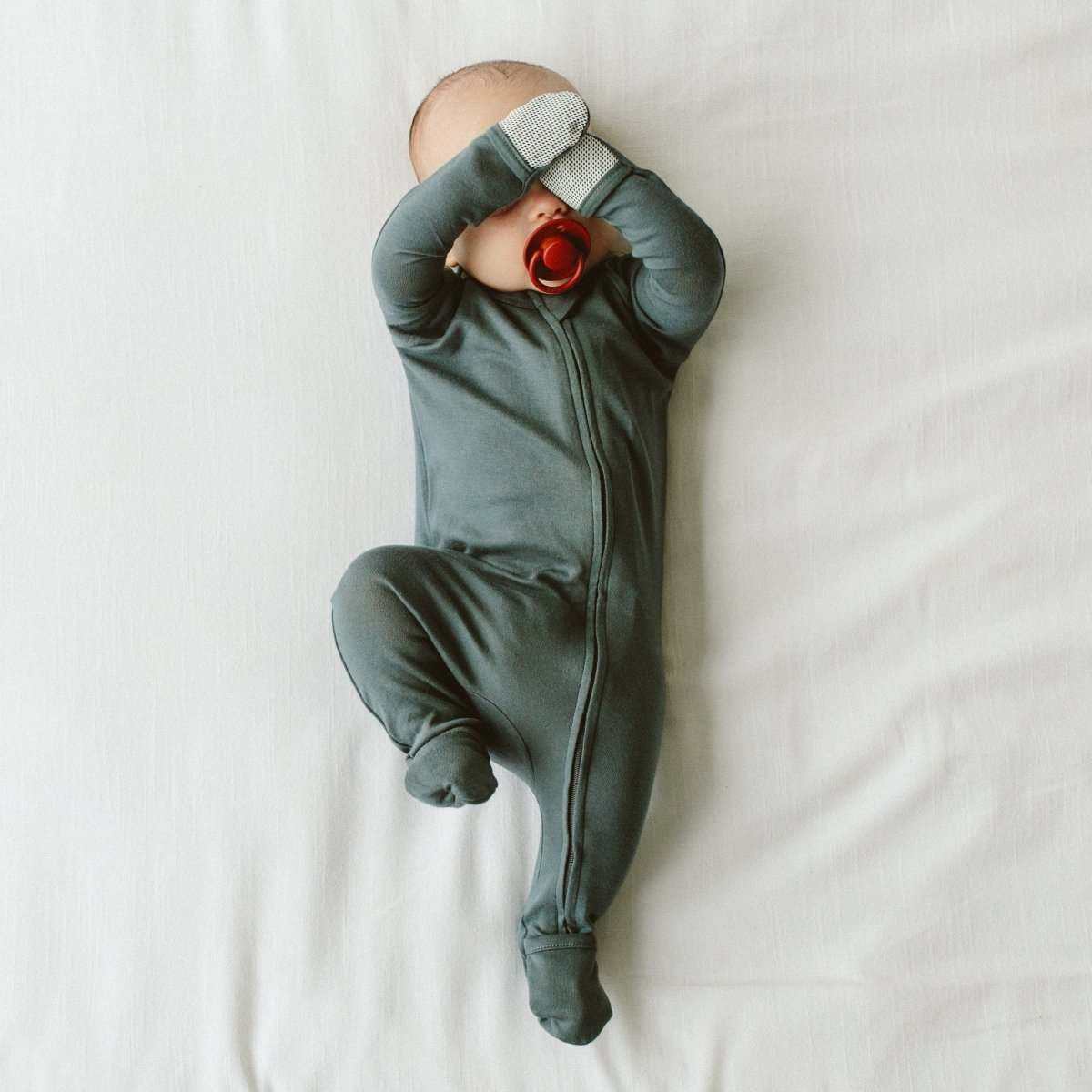 Goumi Kids MIDNIGHT Grow With You Baby Footie Snug Fit – bamboo viscose organic cotton blend – on baby