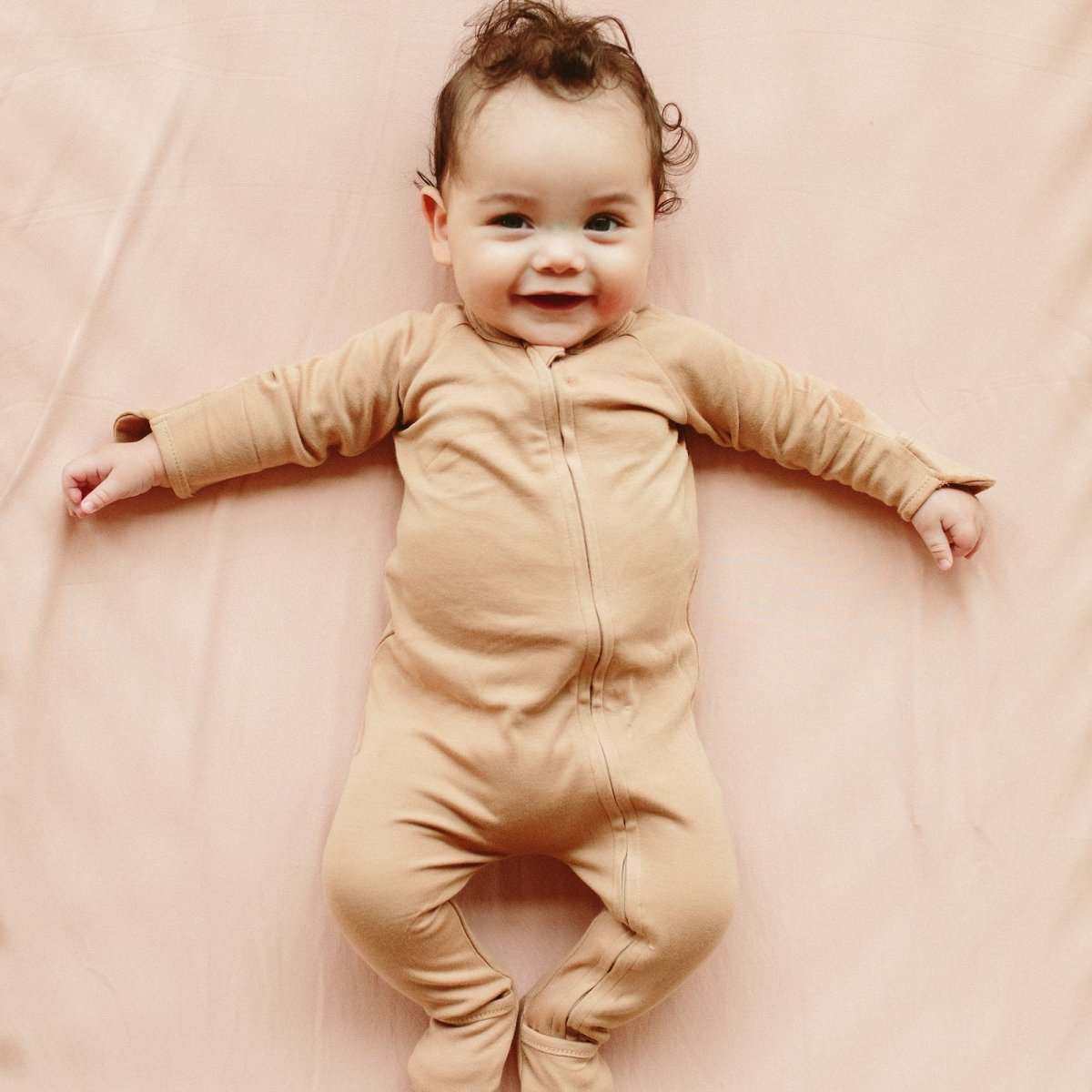 GROW WITH YOU FOOTIE baby convertible romper in sandstone bamboo cotton with long sleeves and front zip