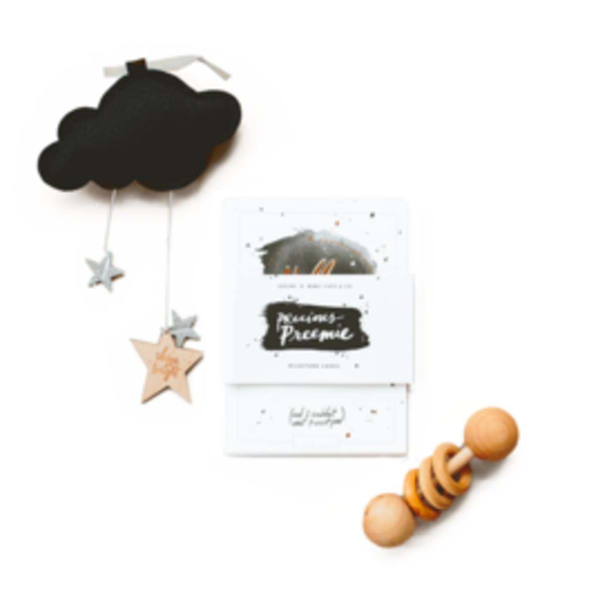 Preemie Sleep Set with black cloud mobile, printed cards and natural wood bead teether in a gift arrangement