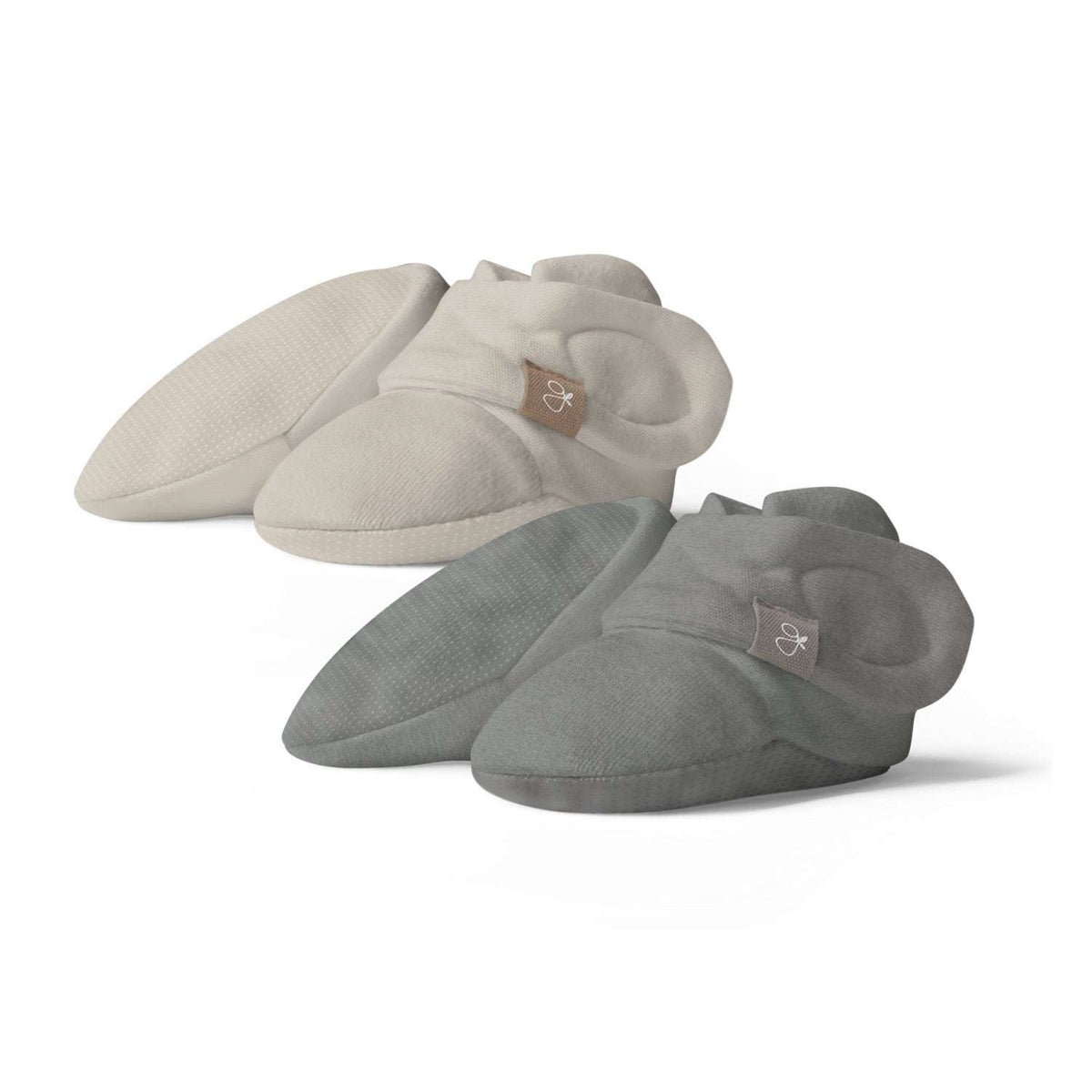 Quiet Night Starter Set with two pairs of soft baby booties in warm beige and muted sage, featuring textured soles and folded cuffs