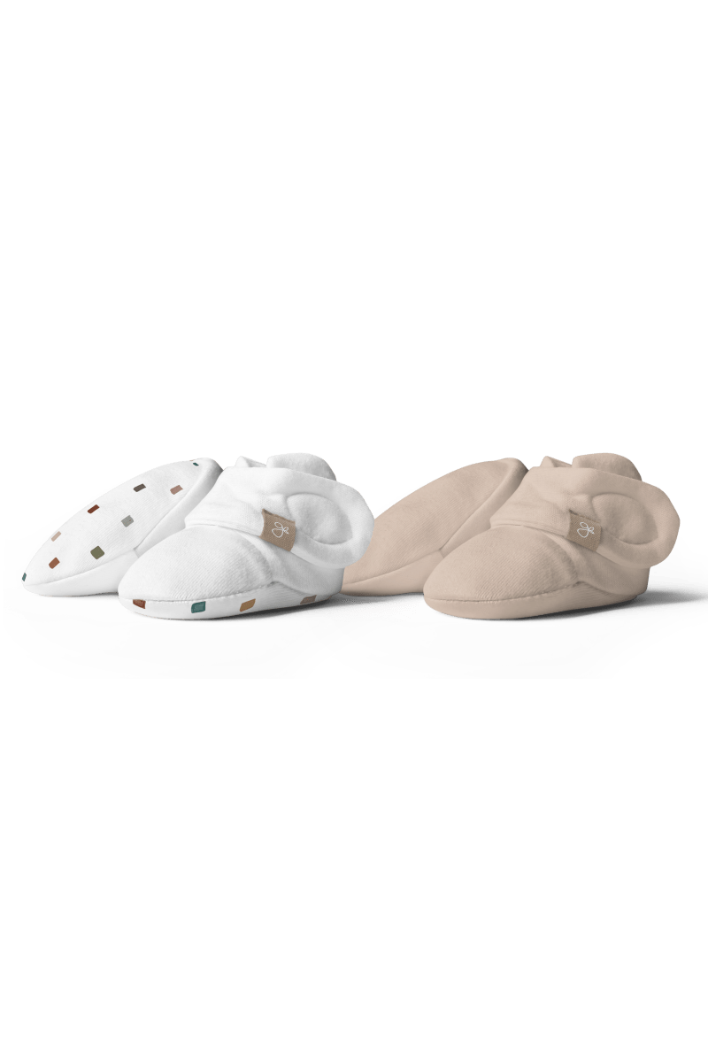 STAY ON 2-PACK BOOTS in white and sandstone, with a geometric print and adjustable wrap closures.
