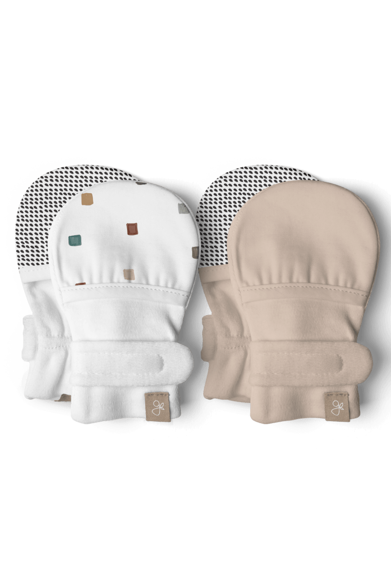 STAY ON 2-PACK MITTS in white and sandstone, with a small multicolour block print and adjustable wrap closures