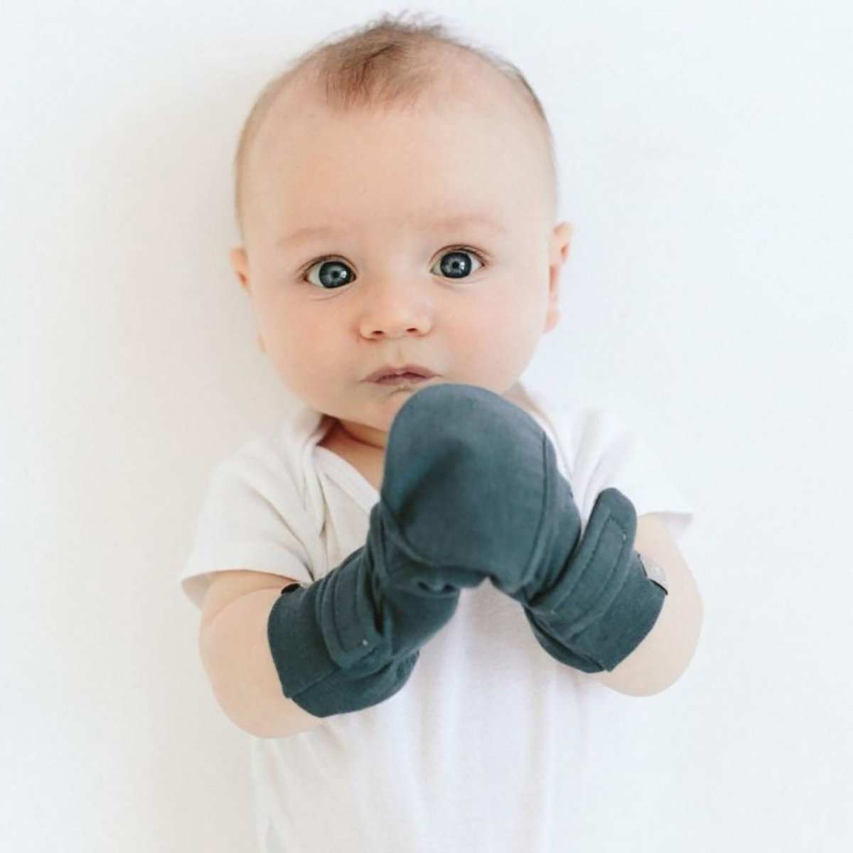 Stay on baby mittens in midnight color with reversible black and white pattern