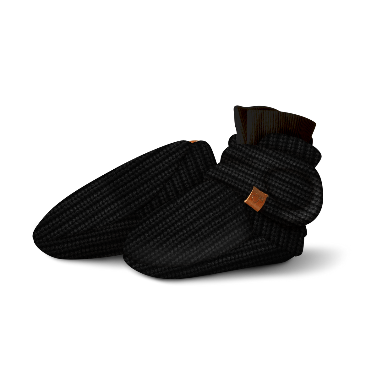 Stay on Knit Boots in black textured knit, featuring a soft cuff, adjustable wrap closure and small tan leather tag.