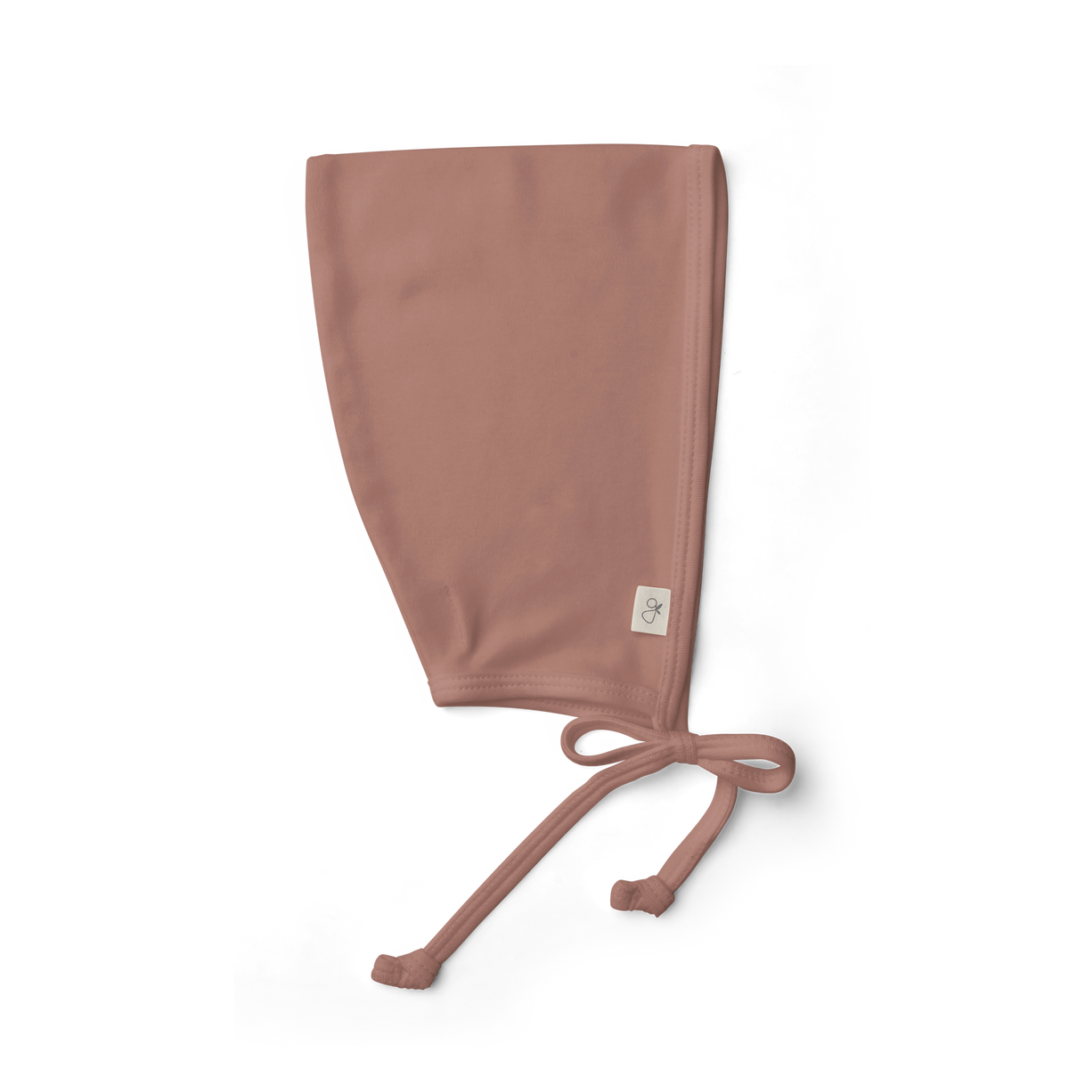 Welcome Home Set with a soft dusty rose baby bonnet, featuring a smooth fabric finish and tie straps