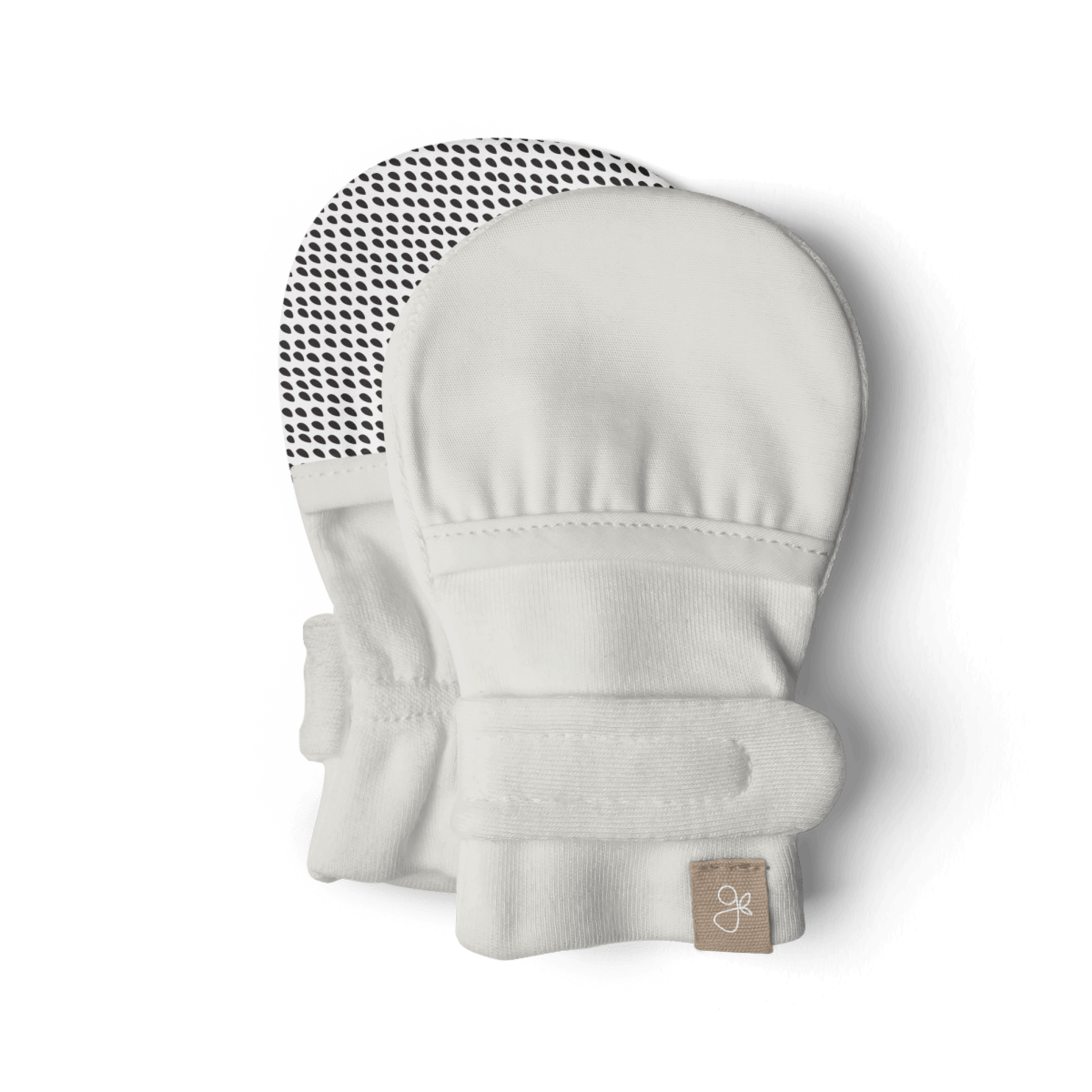 Welcome Home Set includes soft white baby mitts with a smooth knit finish and black dotted grip-patterned palms
