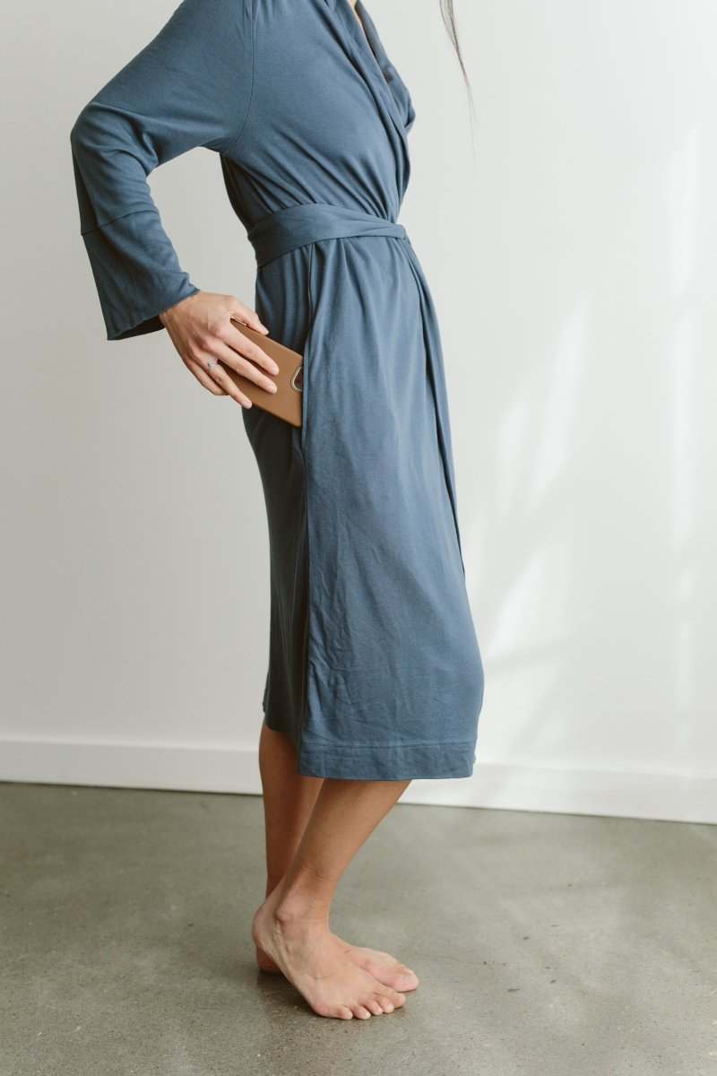 WOMENS ROBE in muted slate blue, made from soft smooth fabric with a wrap front, waist tie and three-quarter sleeves