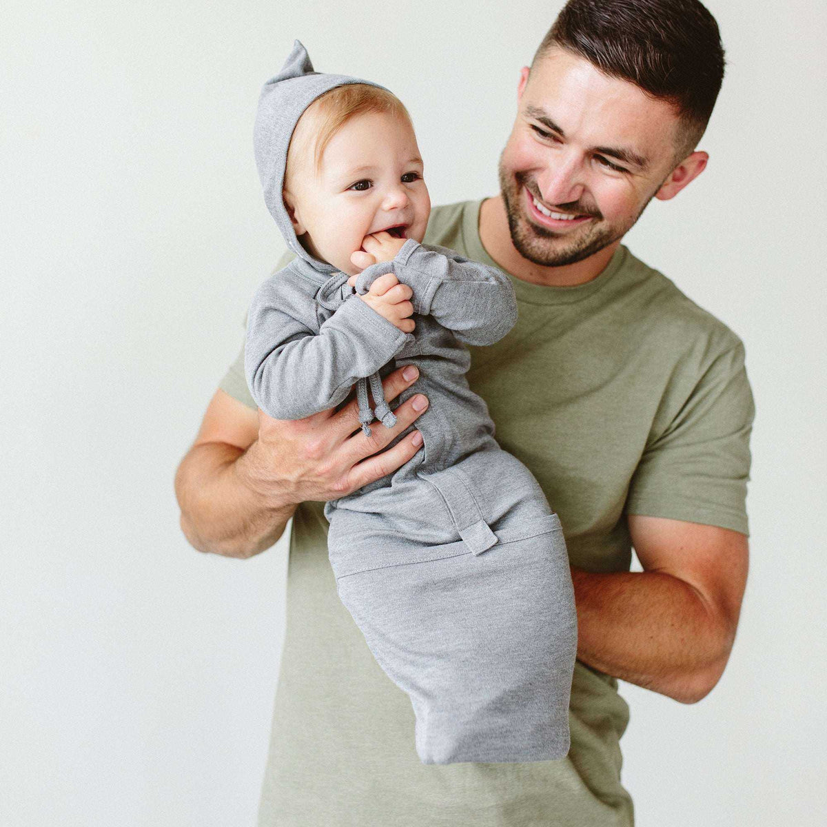 24 HOUR CONVERTIBLE GOWN in soft heather gray knit, with a hood, long sleeves and a convertible foot pocket