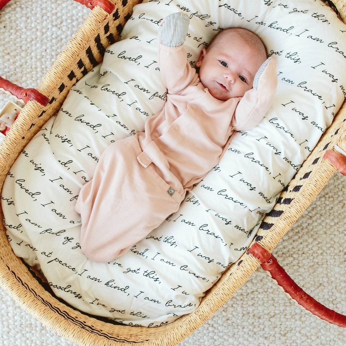 24 HOUR CONVERTIBLE GOWN in soft rose pink with long sleeves, built-in patterned mitts and a snap conversion closure