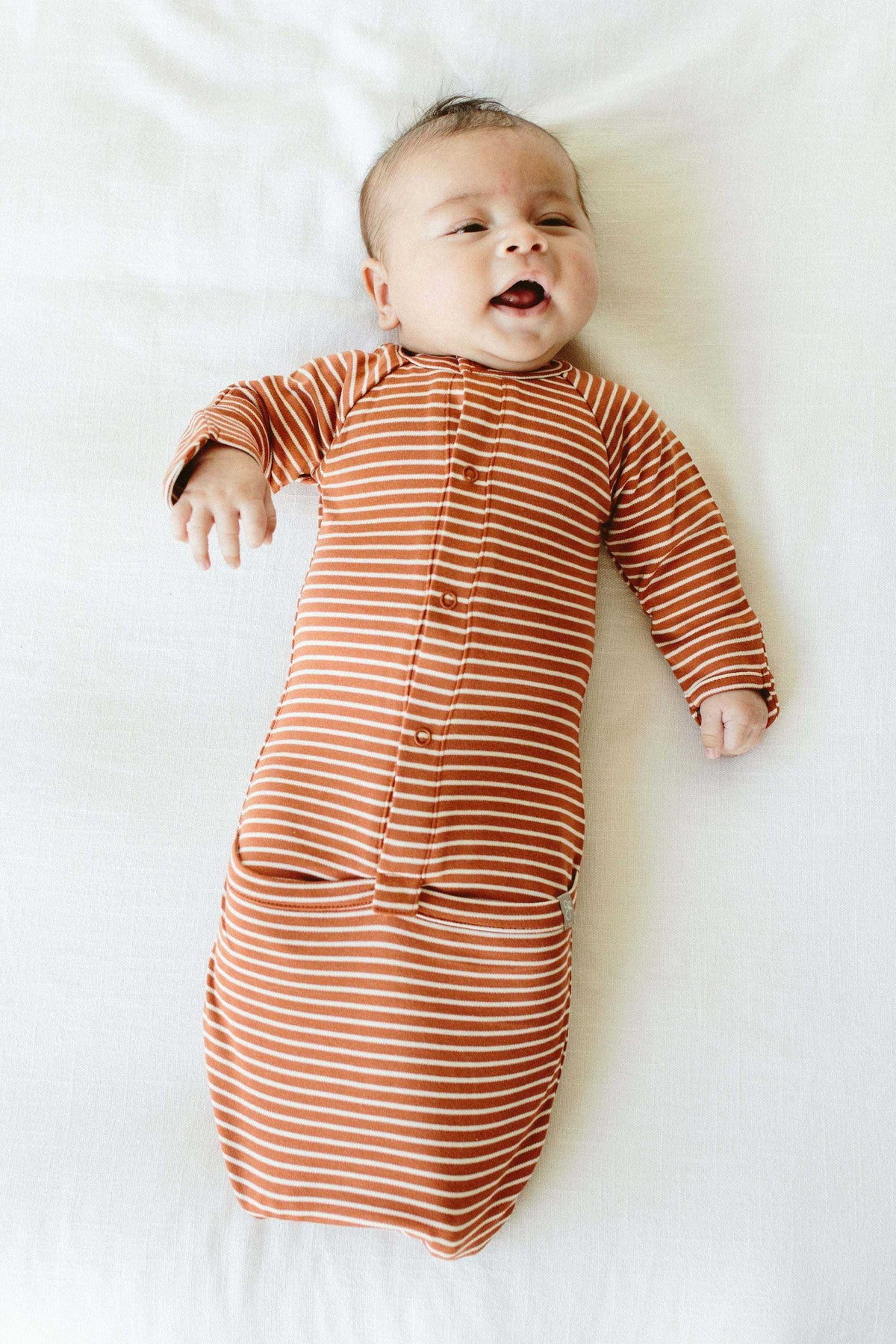 24 HOUR CONVERTIBLE GOWN in rust-orange and cream stripes, with long sleeves and a gathered convertible hem