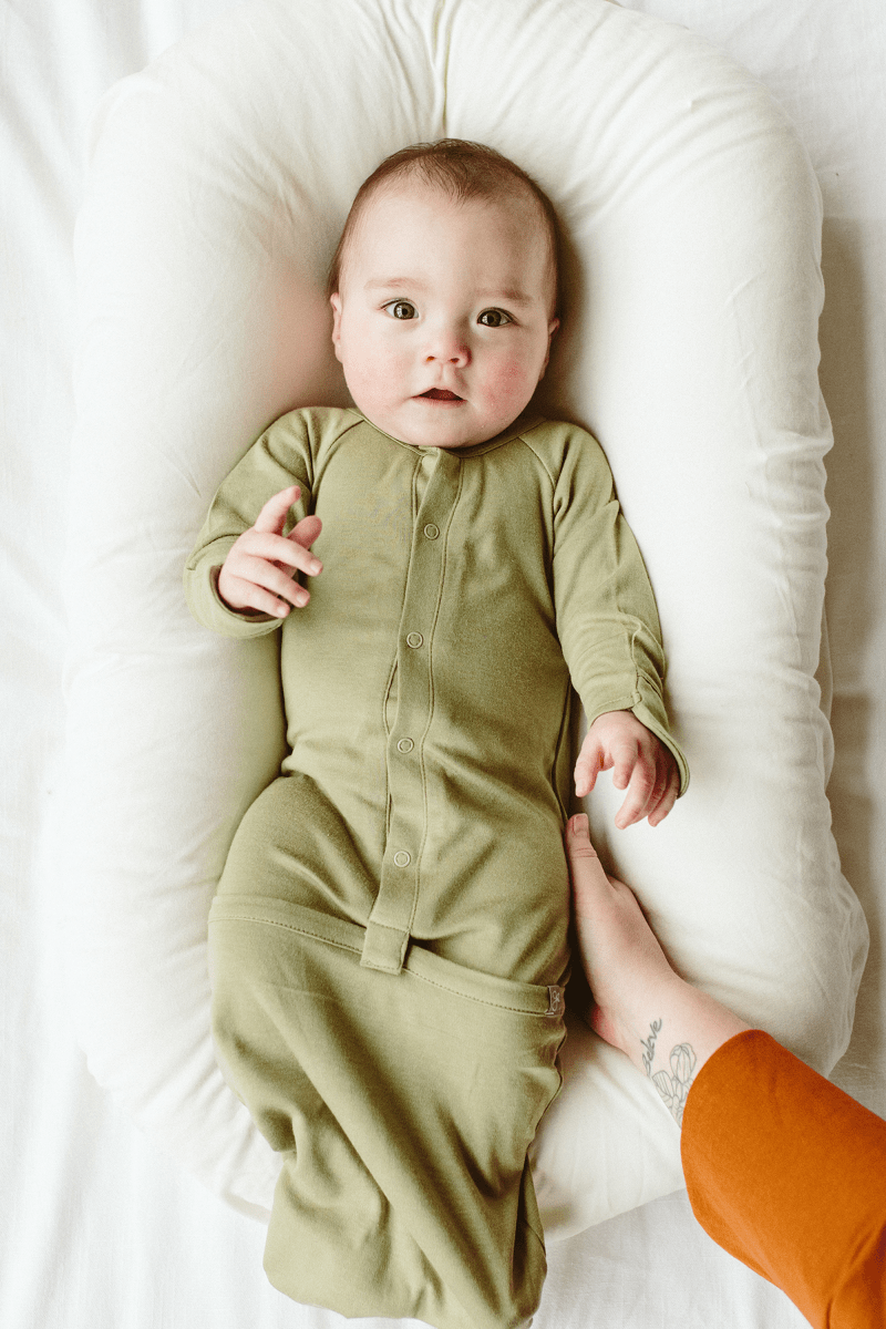 24 HOUR CONVERTIBLE GOWN in sage green with soft fabric, long sleeves, front snaps and a gathered convertible foot pocket