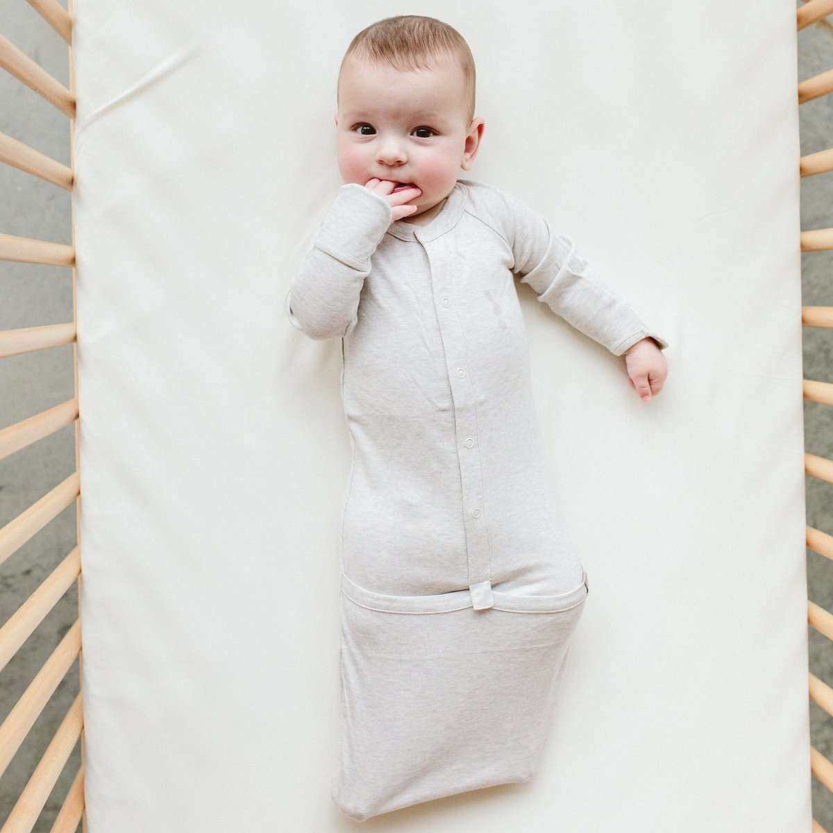 24 HOUR CONVERTIBLE GOWN in storm gray, a soft solid-color baby gown with long sleeves and a convertible snap closure