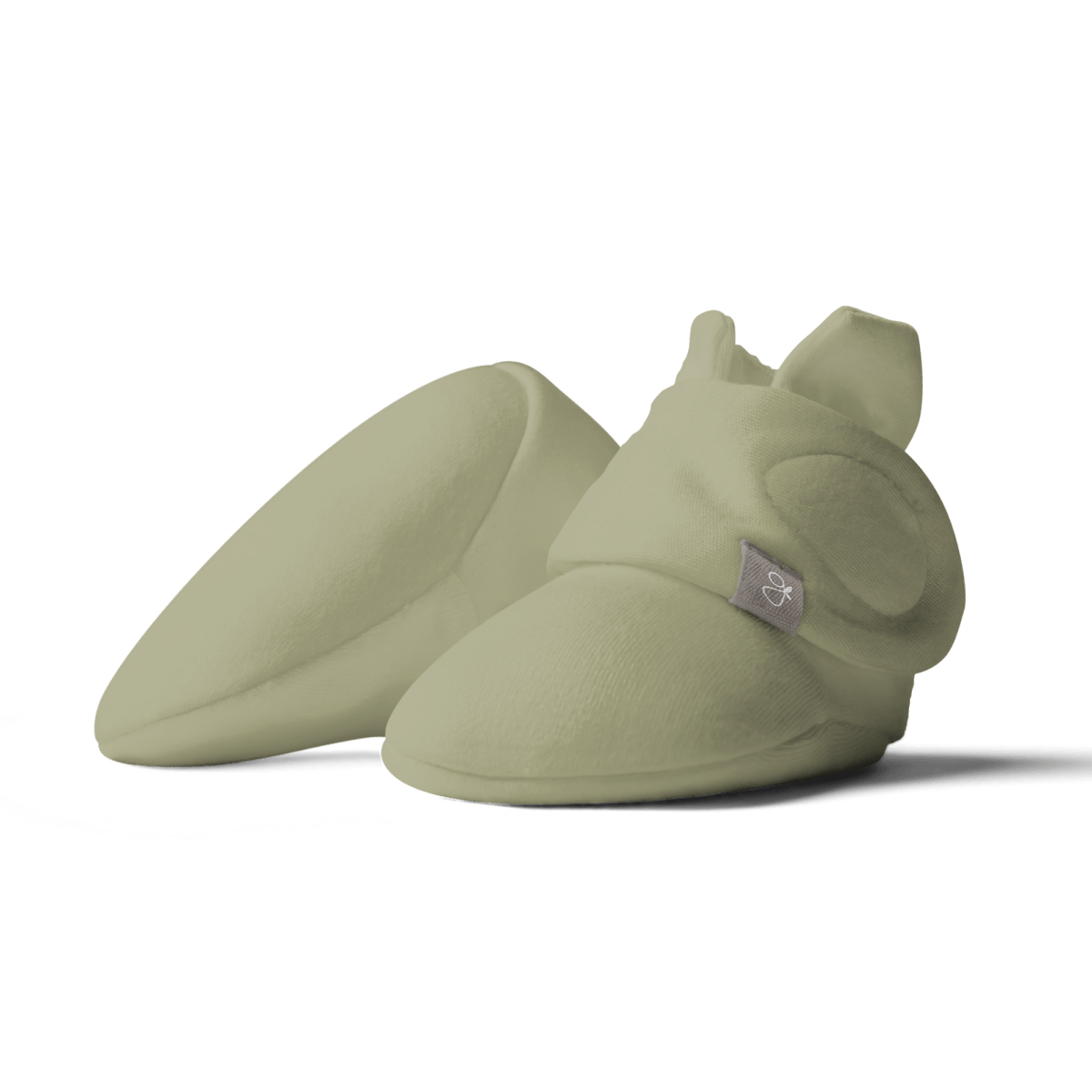 STAY ON BOOTS in muted sage green, with a soft fabric finish, rounded toes, and adjustable wraparound flaps