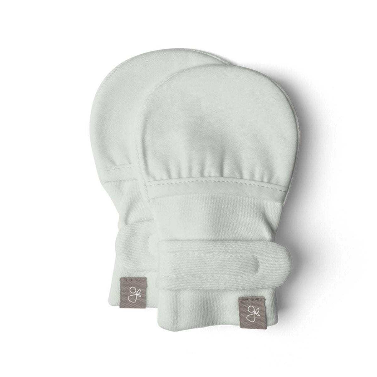 STAY ON MITTS baby mitts in pale mint green soft fabric, with adjustable wraparound closures and small logo tags